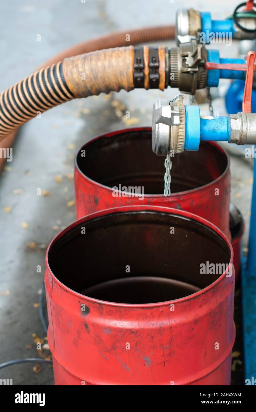 Big Truck Hoses for fuel station, pumps and oil barrels Stock Photo Alamy