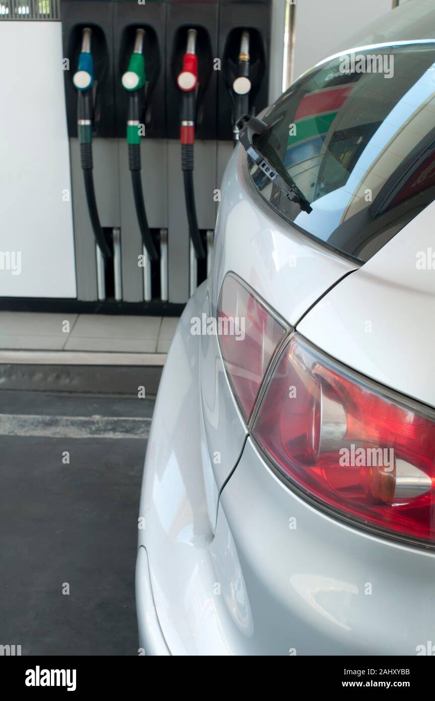 Gray car at a gas station Stock Photo Alamy