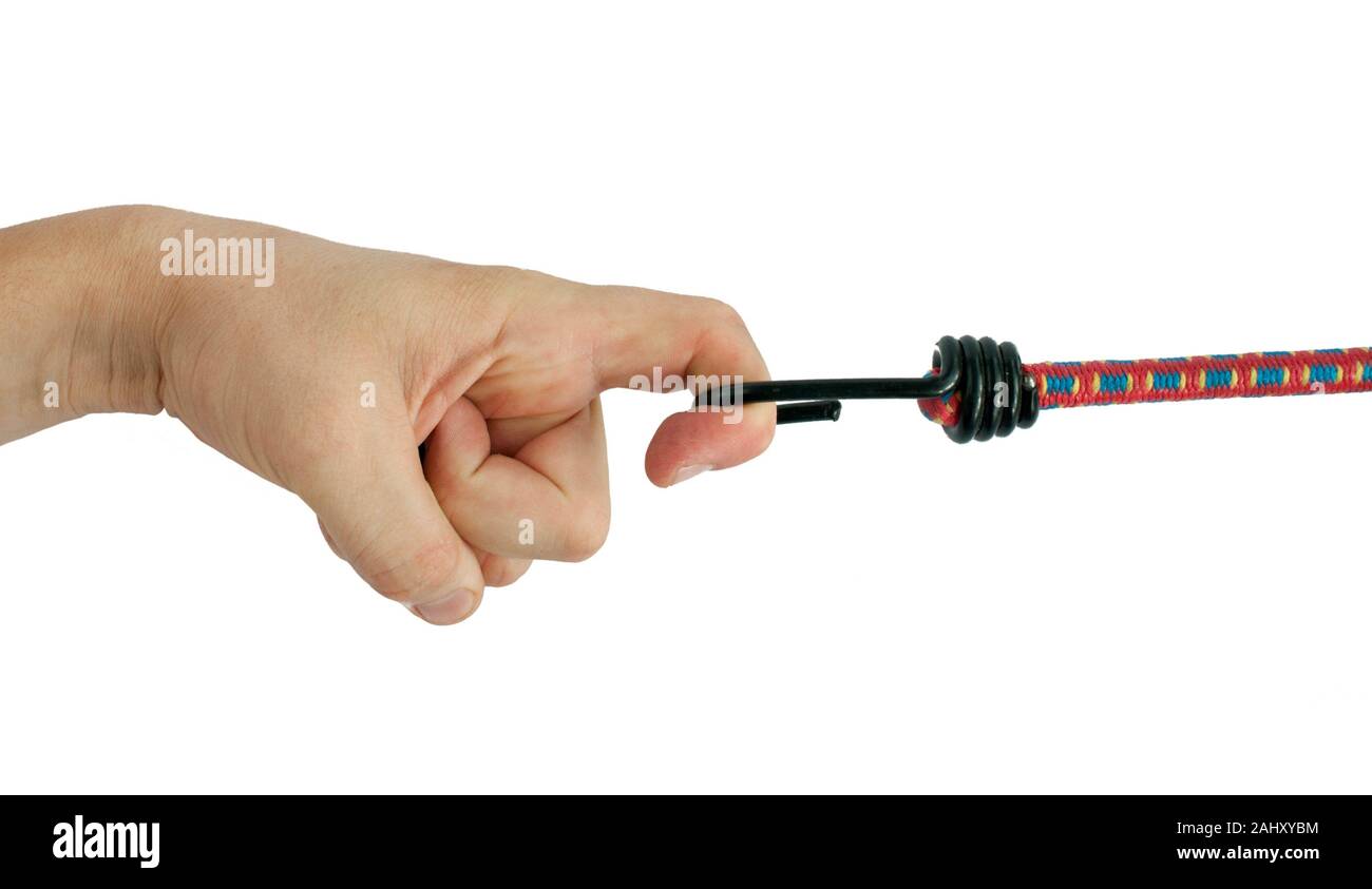 Hand holding elastic rope with hook. Stock Photo