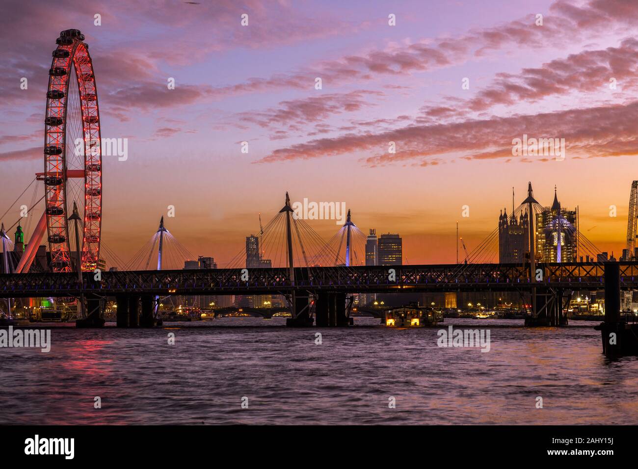 Landscape London skyline, London Eye, dusk, twilight, blue hour with the Southbank and River Thames travel destination, London England UK Stock Photo