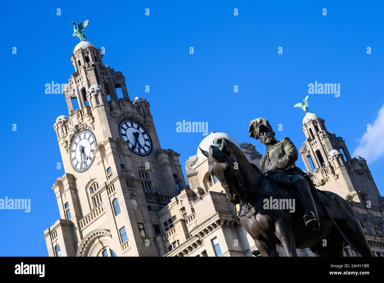 Equestrian statue (1921) of King Edward VII and the Royal Liver Building (1911), a Grade I listed building on Pier Head, Liverpool, England, UK Stock Photo