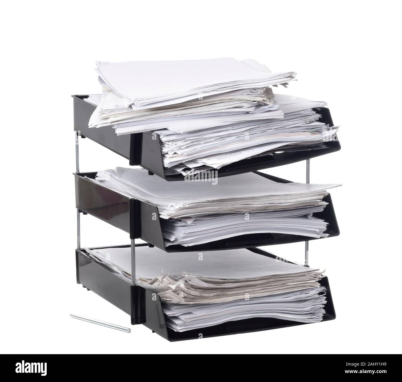 Broken, overloaded office paper filing trays isolated on white ...