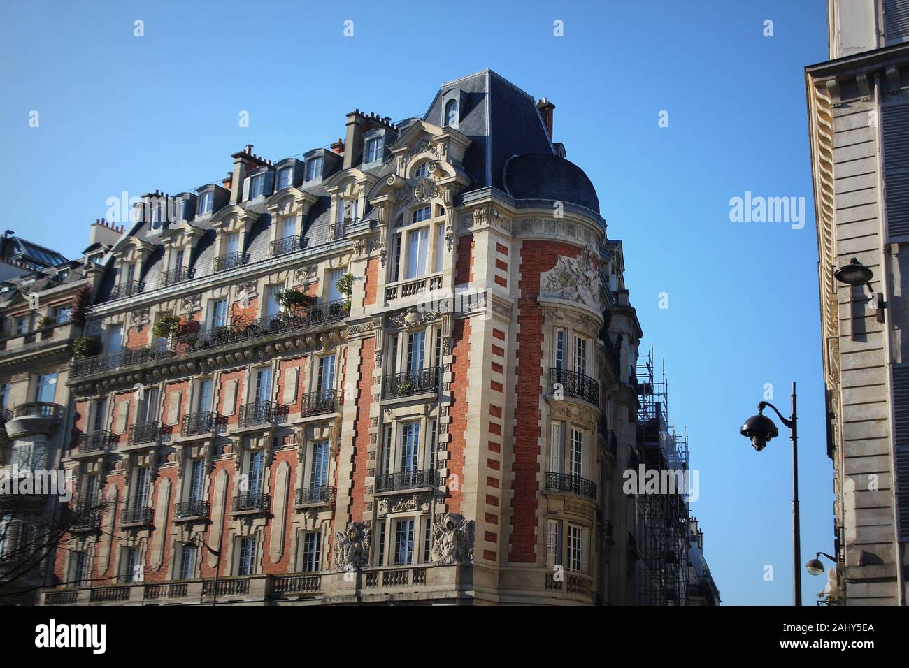 Exterior of a multi-storey historical townhouse in Paris with an ornate ...
