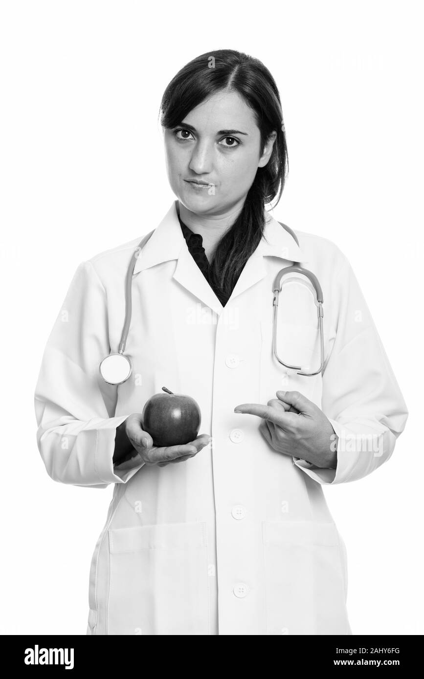 Portrait of beautiful woman doctor as nutritionist with apple Stock Photo
