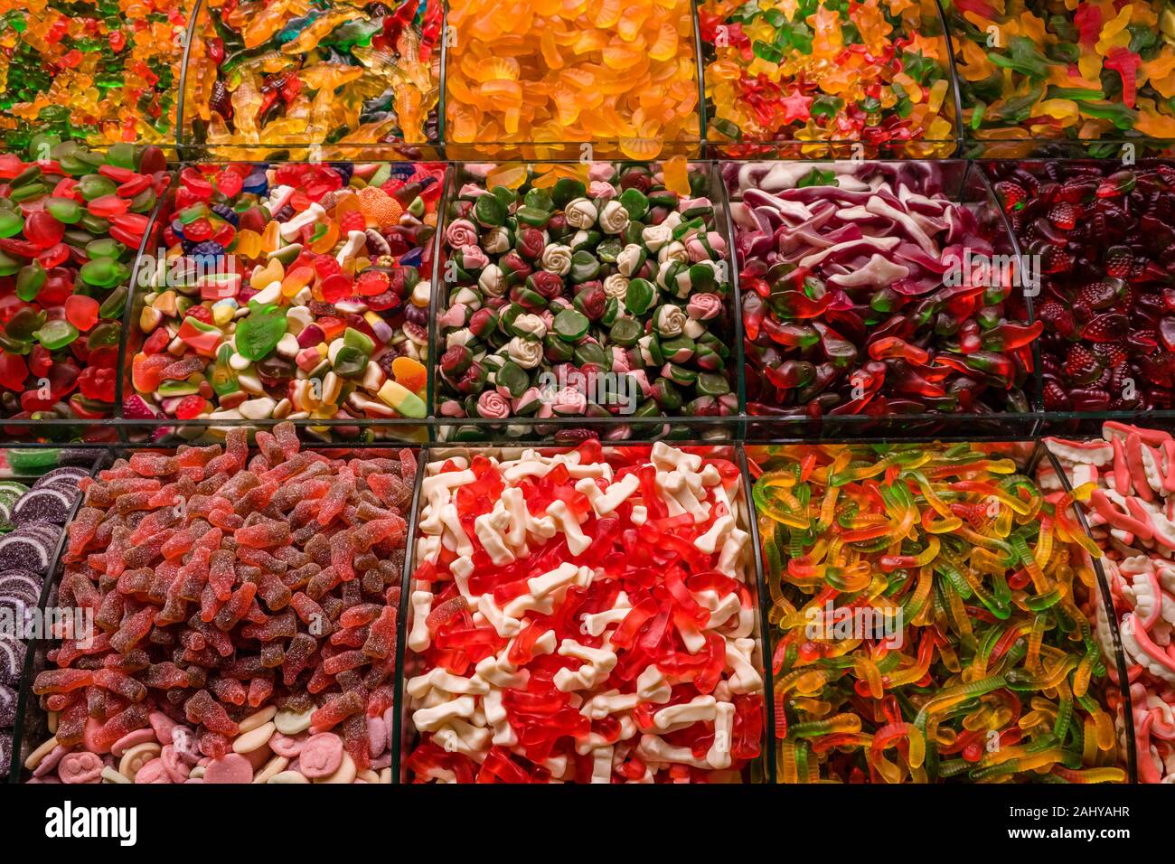 Big variety of colorful sweets are offered for sale inside the Spice Bazaar, Mısır Çarşısı, also known as Egyptian Bazaar Stock Photo
