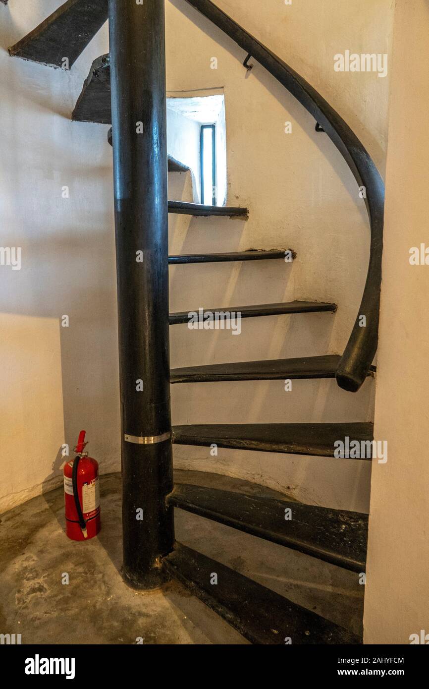 The wooden belian spiral staircase at The Brooke Gallery, Brooke Museum, Fort Margherita