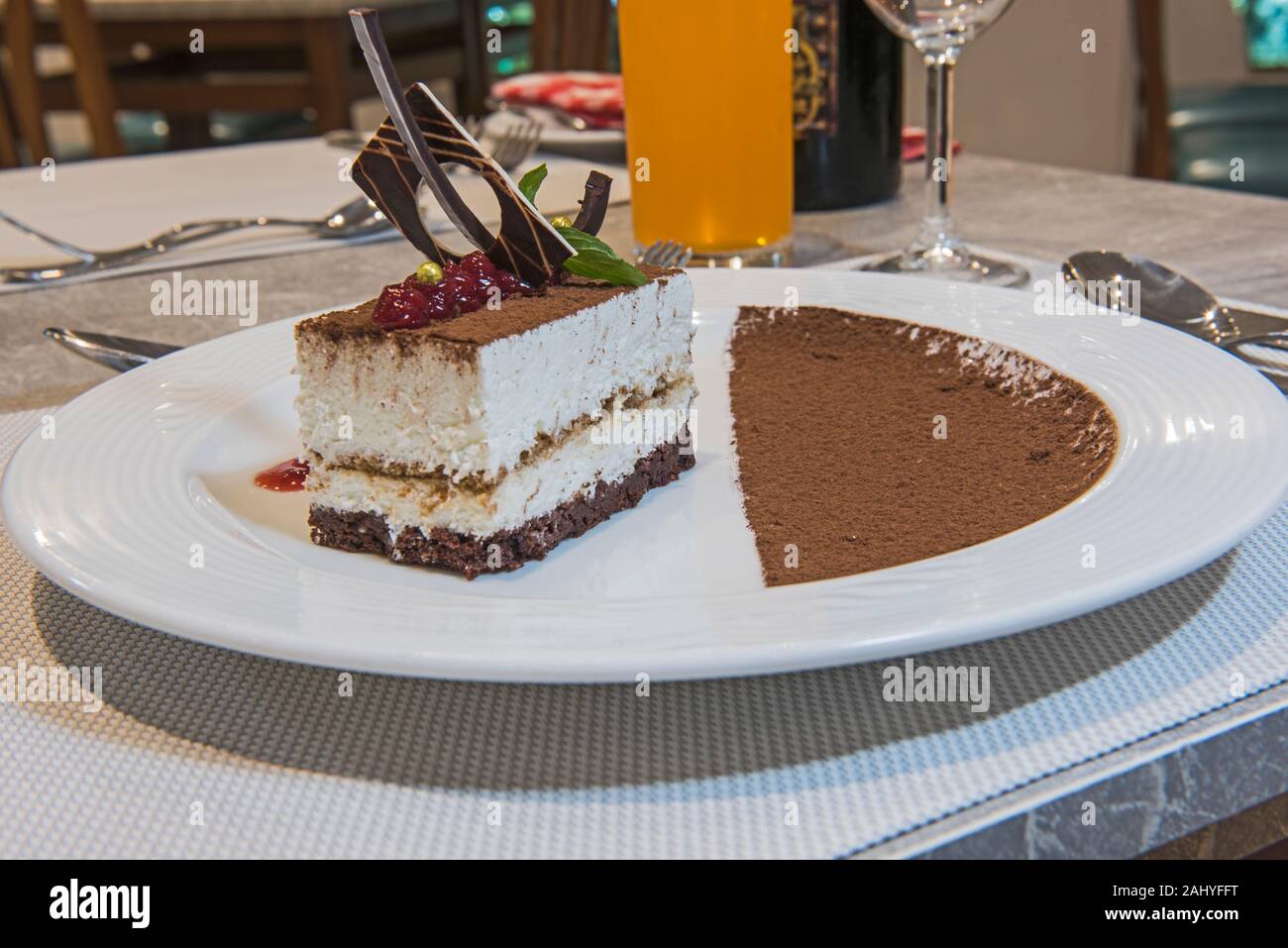 Tiramisu dessert food at luxury a la carte restaurant with cocoa Stock Photo