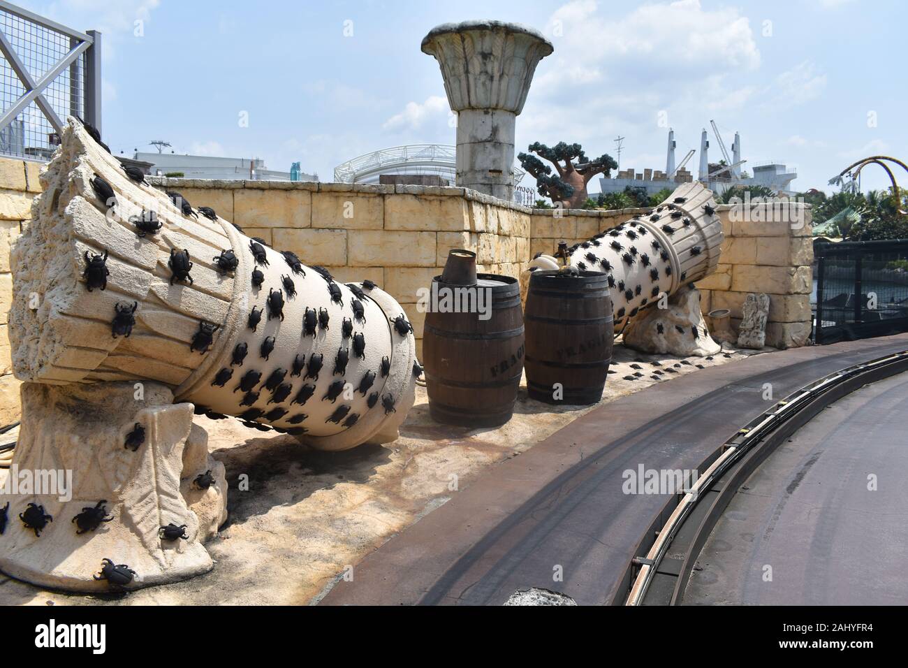 Universal Studios Singapore, Asia, 11th august 2019: Several Scorpios on rounded rock with empty road Stock Photo