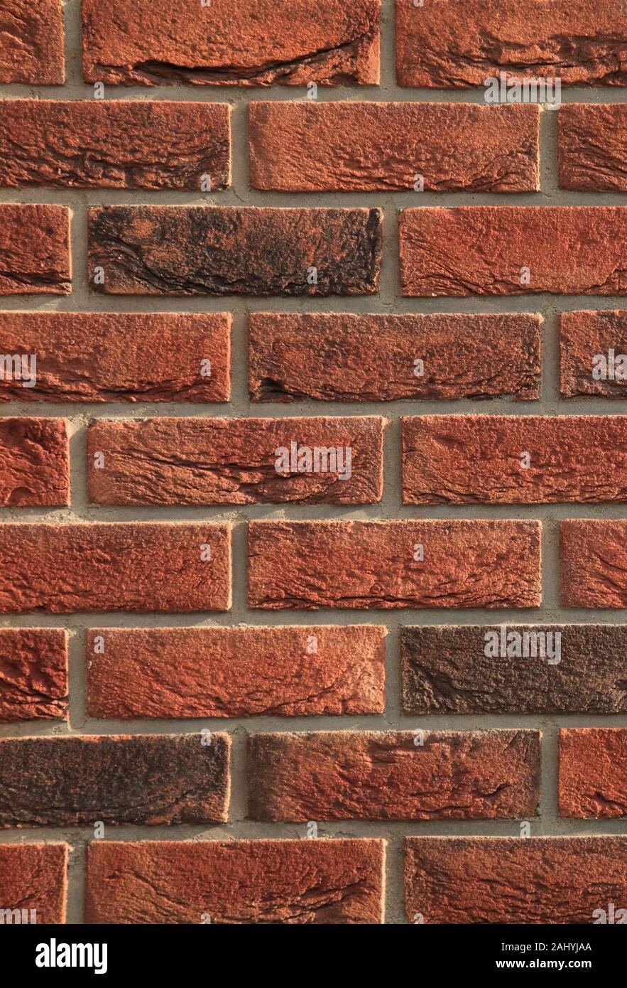 Decorative wall texture, background. Rusty, matted, red bricks. The  fragment of a new stylish decorative bricklaying. Vintage and antique style  Stock Photo - Alamy