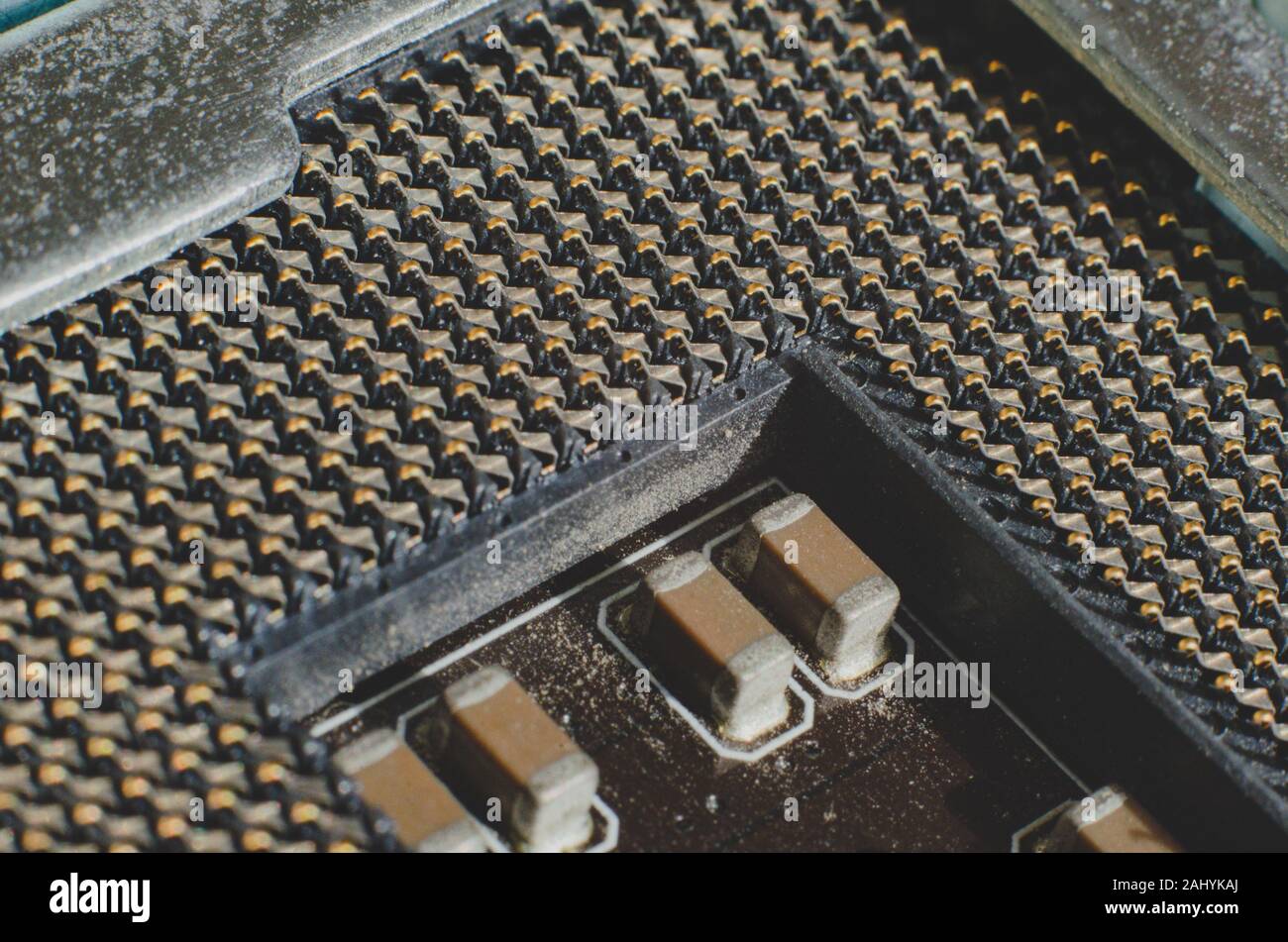 Detailed view of an empty cpu socket. Macro photo of the chips and pins of the socket of the main processor of the desktop computer. Upgrade Stock Photo