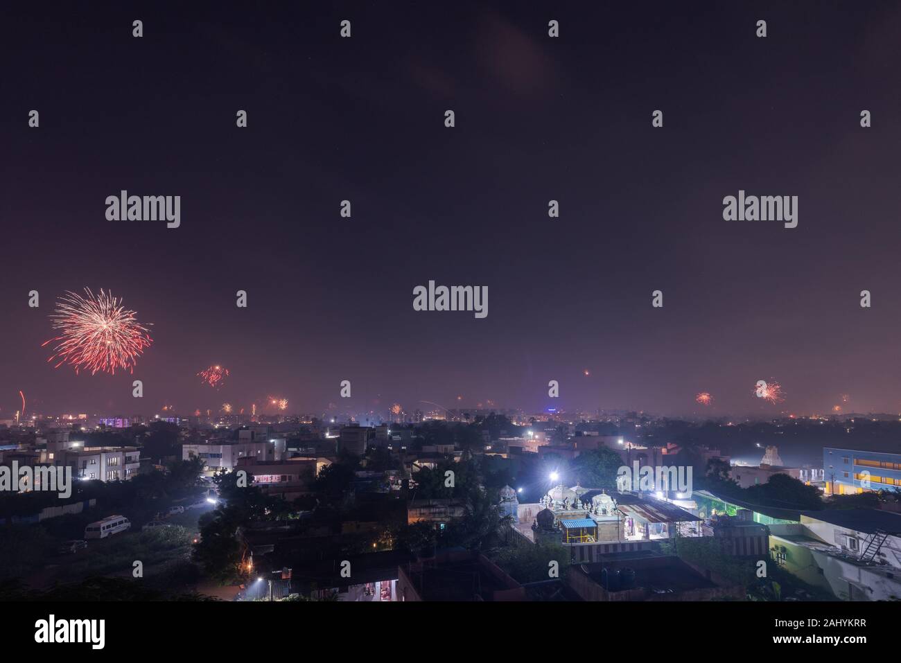 Bursting fireworks during the Divali festival of light over the city of Chennai in South India Stock Photo