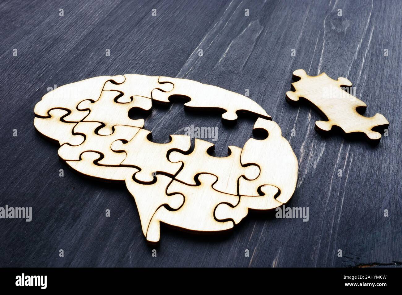Brain from wooden puzzles. Mental Health and problems with memory Stock