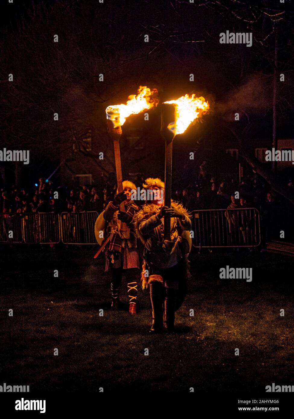 Flamborough Fire Festival. New Year's Eve 2019 celebrating the village connection with Viking History. Featuring the Flamborough Fireballs, Torchlit Procession and burning of a Viking Longboat on the village green. Stock Photo