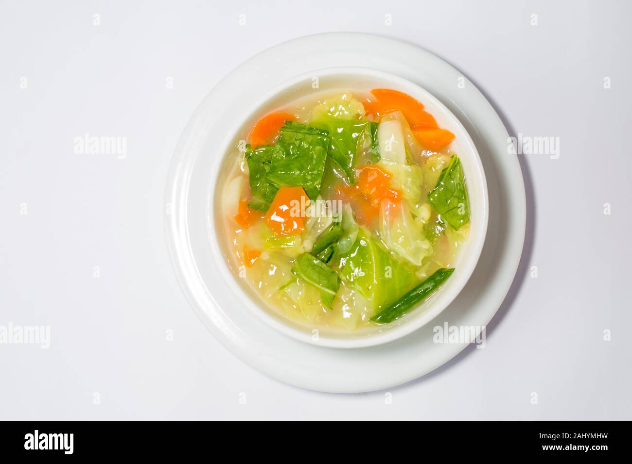 https://c8.alamy.com/comp/2AHYMHW/hot-mix-thai-vegetable-soup-on-a-white-bowl-top-view-2AHYMHW.jpg
