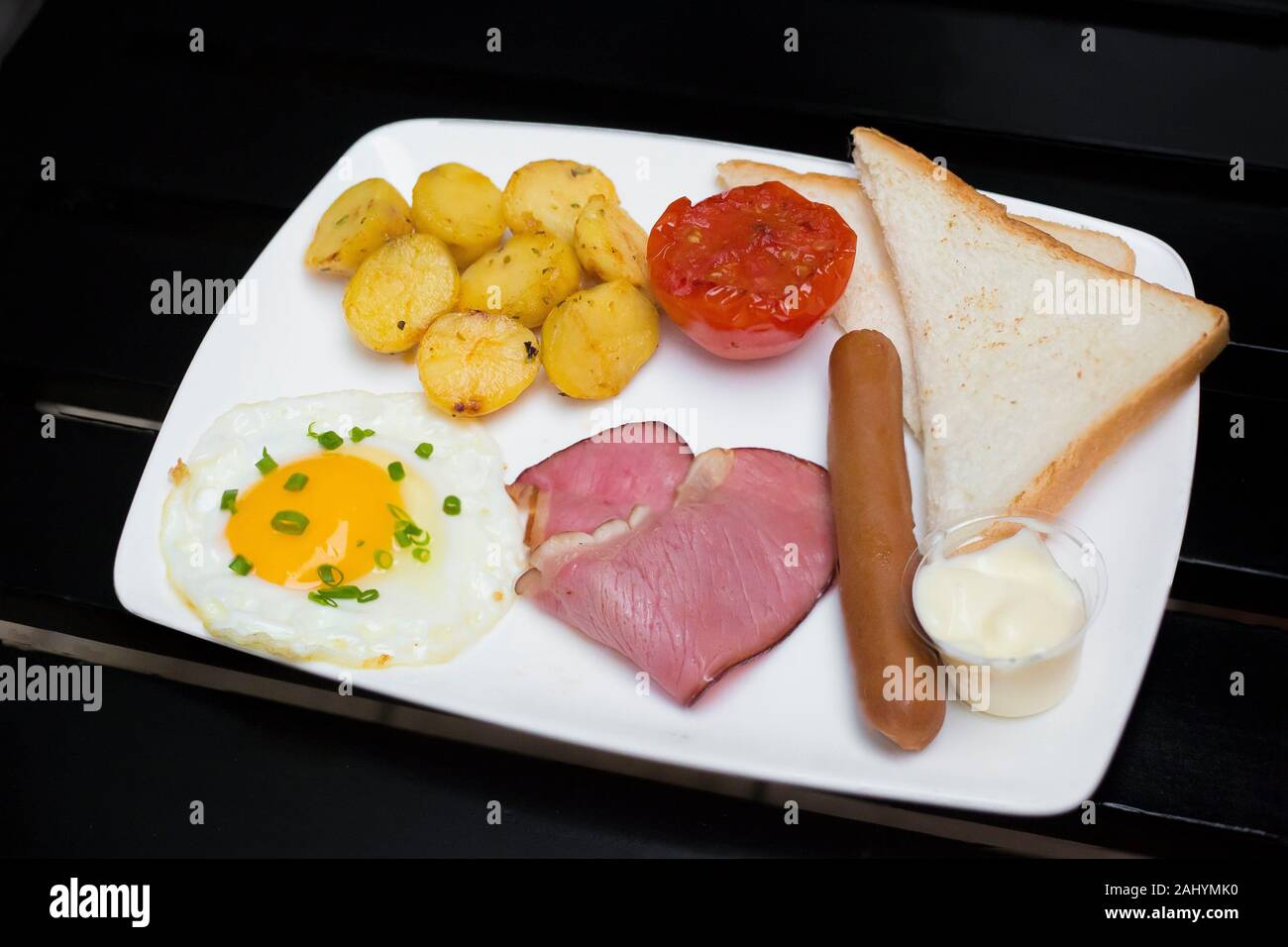 Continental breakfast â. “ one egg omlet, baked potato; backed tomato