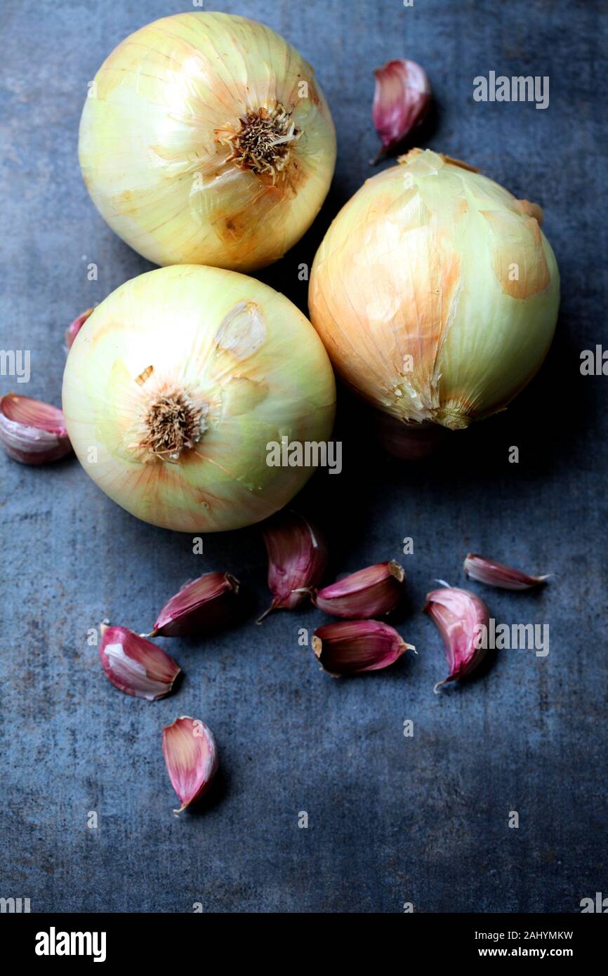 Close up of clove of garlic with onions hires stock photography and