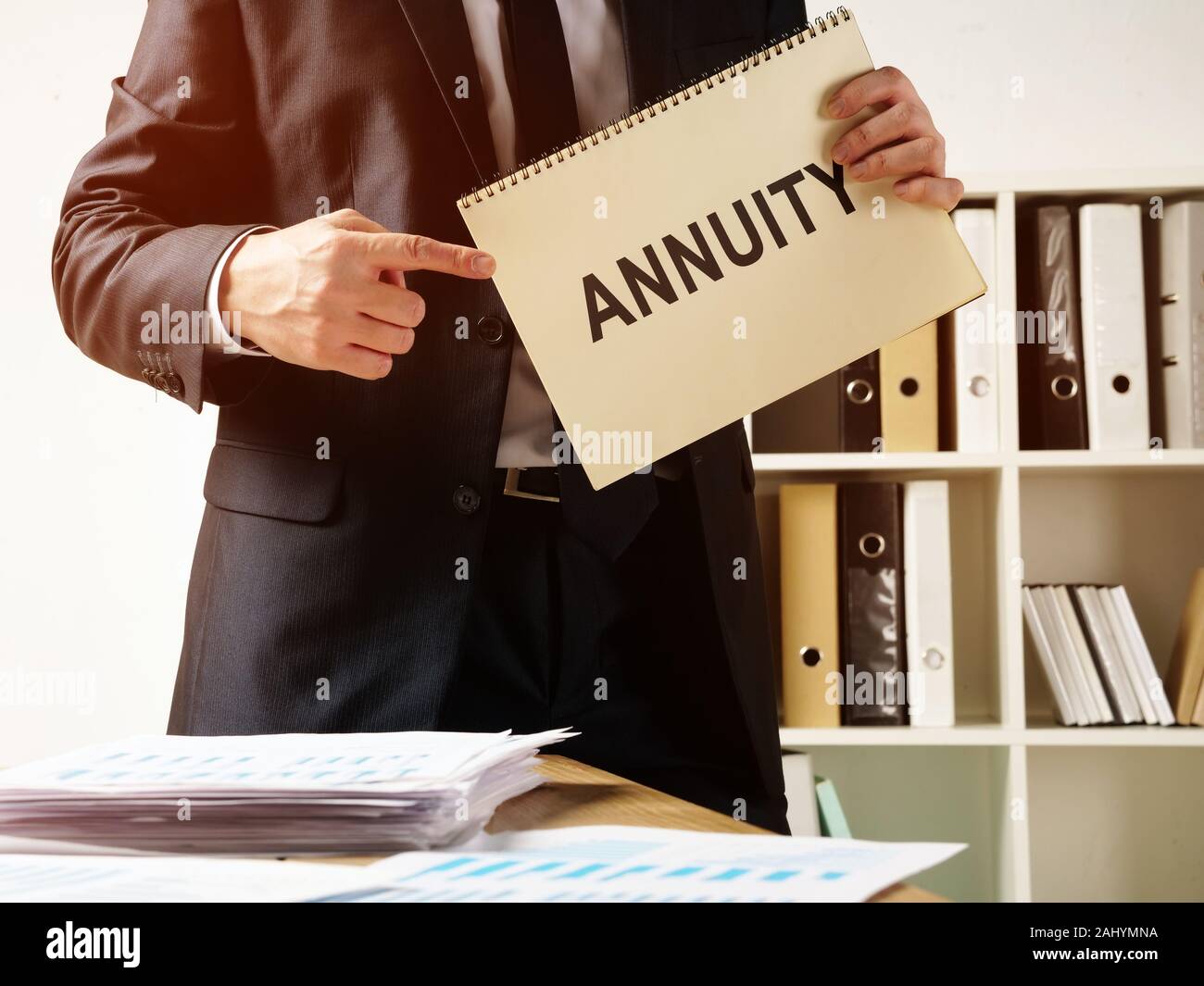 Annuity sign in the book that holds manager. Stock Photo