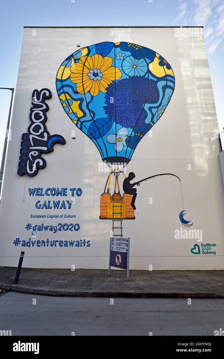 mural painting announcing Galway European Capital of Culture 2O2O, Galway, Connemara, County Galway, Republic of Ireland, North-western Europe. Stock Photo