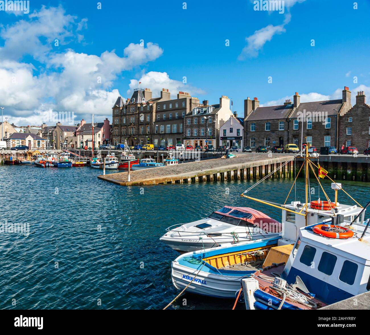 View of Kirkwall Harbour with Kirkwall Hotel and boats in Kirkwall Orkney Scotland UK Stock Photo