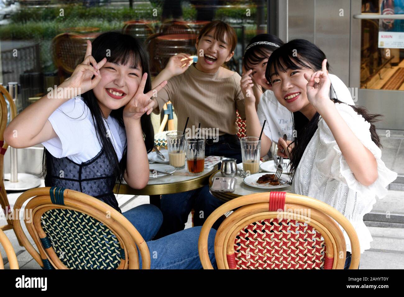 Happy Japanese Women Sitting At Table In Coffee Shop Osaka Japan Asia Stock Photo Alamy Happy Japanese Women Sitting At Table In Coffee Shop Osaka Japan Asia Stock Photo Alamy