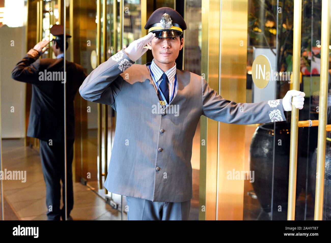 A Doorman In Smart Uniform Open The Door At Iconsiam Or Icon Siam