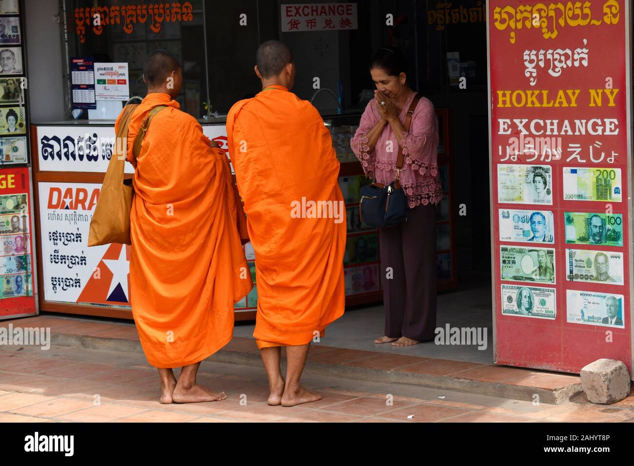 Buddhist monks on their morning alms round,Siem Reap ,Cambodia,South Esat Asia. Stock Photo