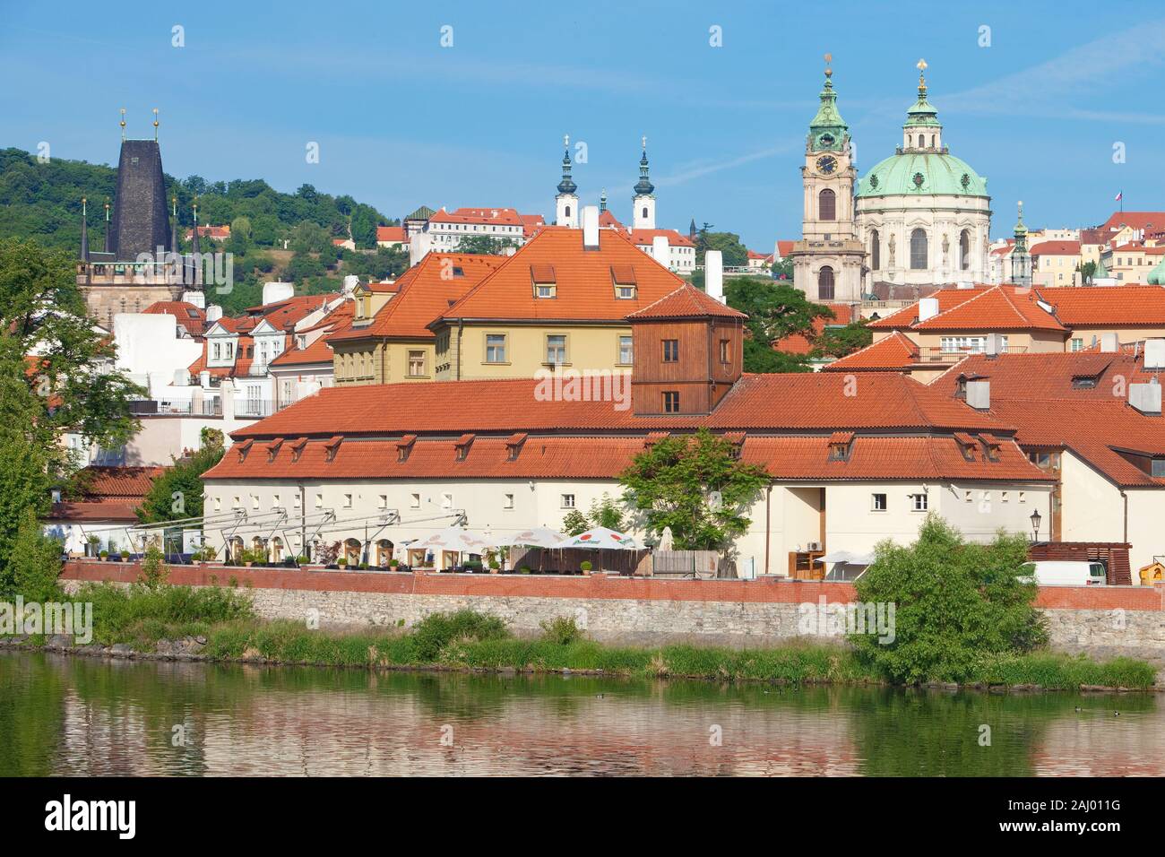 czech republic, prague - st. nicolas church, mala strana (little quarter). vltava river Stock Photo