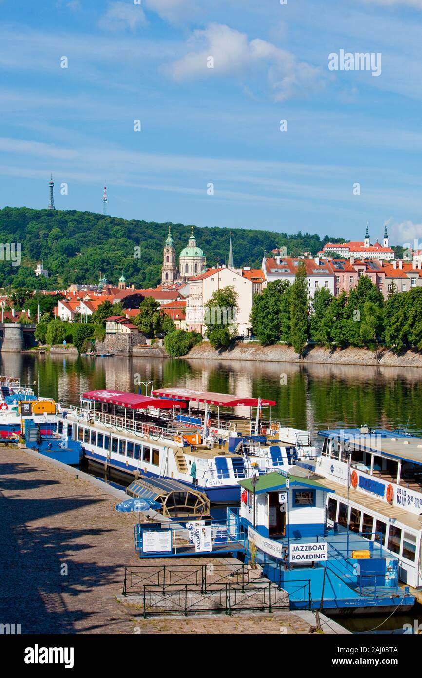 czech republic, prague - tourist boats anchored at vltava river Stock Photo