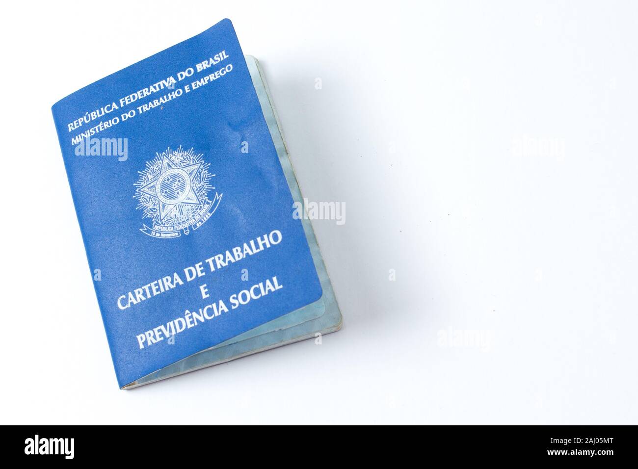 Brazilian work document and social security document (carteira de trabalho)  white background. INSS e FGTS. Carteira de Trabalho e Previdencia Social Stock Photo
