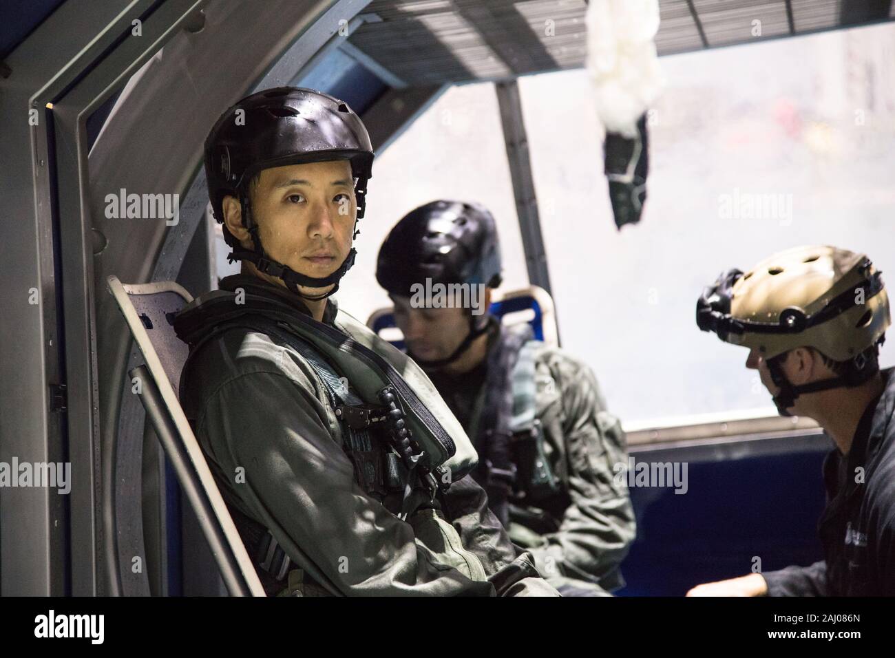 NASA astronaut candidate Jonny Kim during helicopter water survival training in the Sonny Carter Neutral Buoyancy Laboratory at Johnson Space Center September 21, 2017 in Houston, Texas. Stock Photo