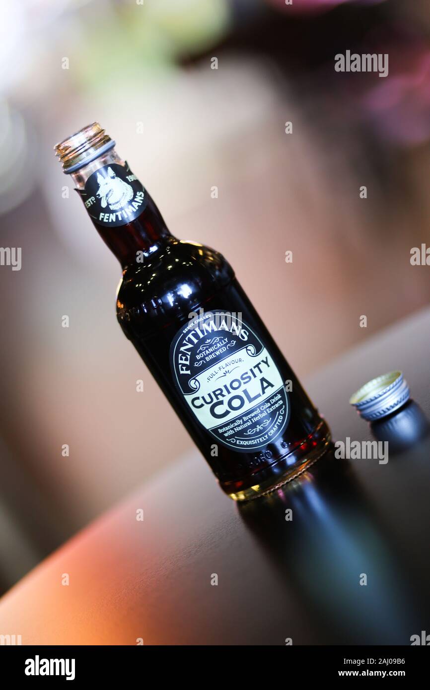 Bucharest, Romania - January 1, 2020: Opened Curiosity Cola bottle on a ...