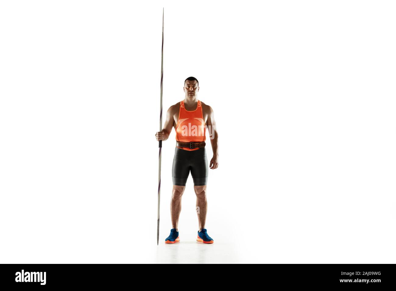 Male athlete practicing in throwing javelin isolated on white ...