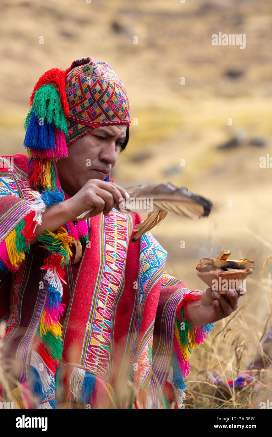 shaman doing a ceremony in the andes peru 2AJ0EG1