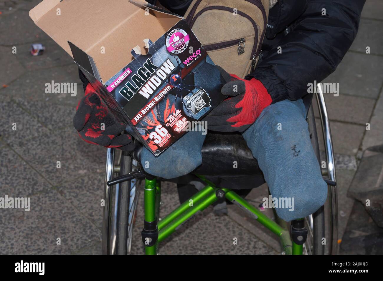 Man in a wheelchair who lost his feet in an explosion 2 years ago Stock ...
