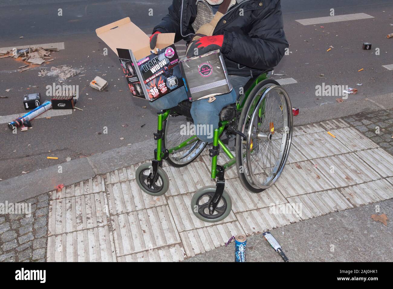 Man in a wheelchair who lost his feet in an explosion 2 years ago Stock ...