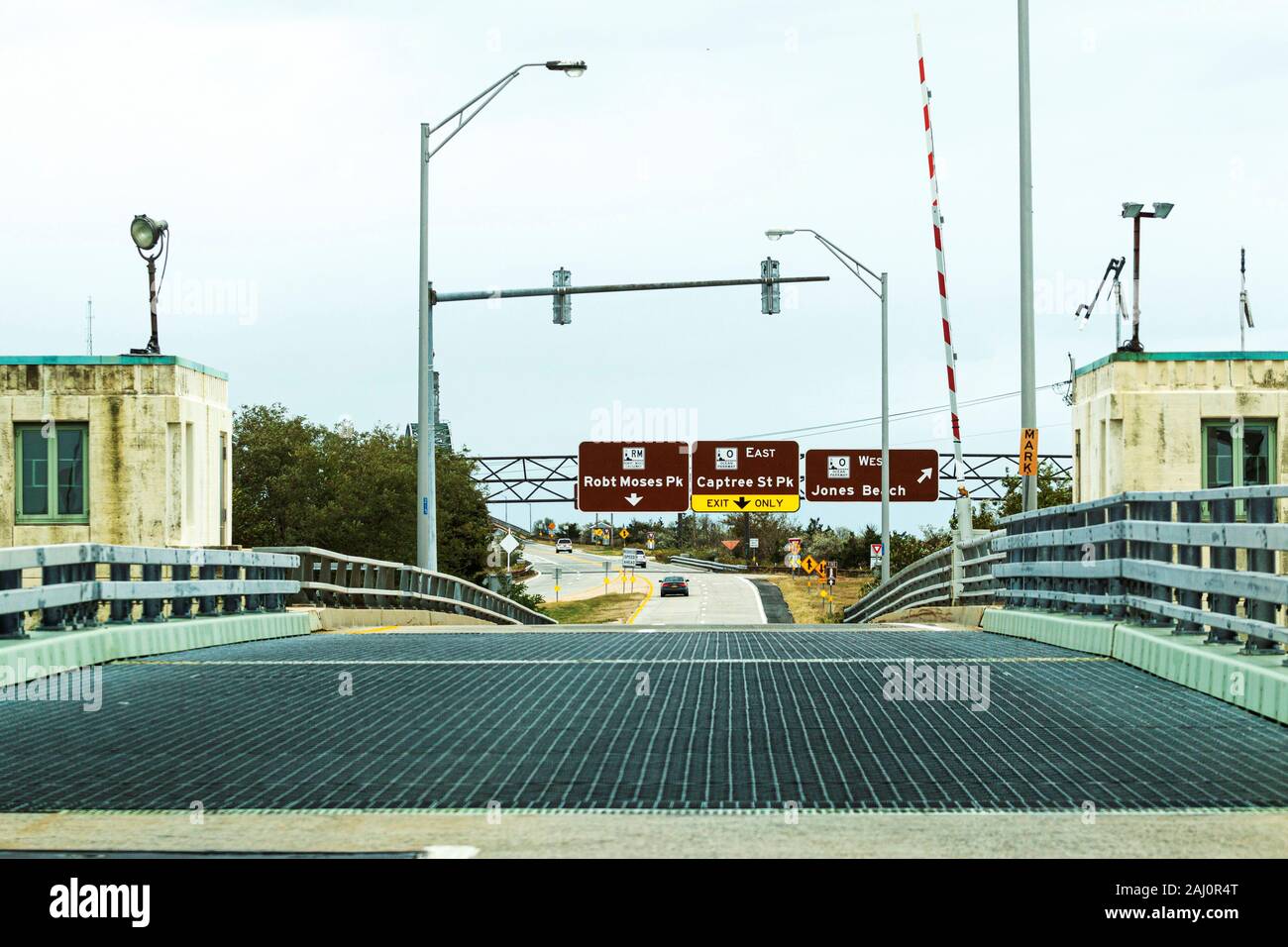 The view of driving over the Captree draw bridge heading to the town and state beaches heading toward Fire Island and the lighthouse. Stock Photo