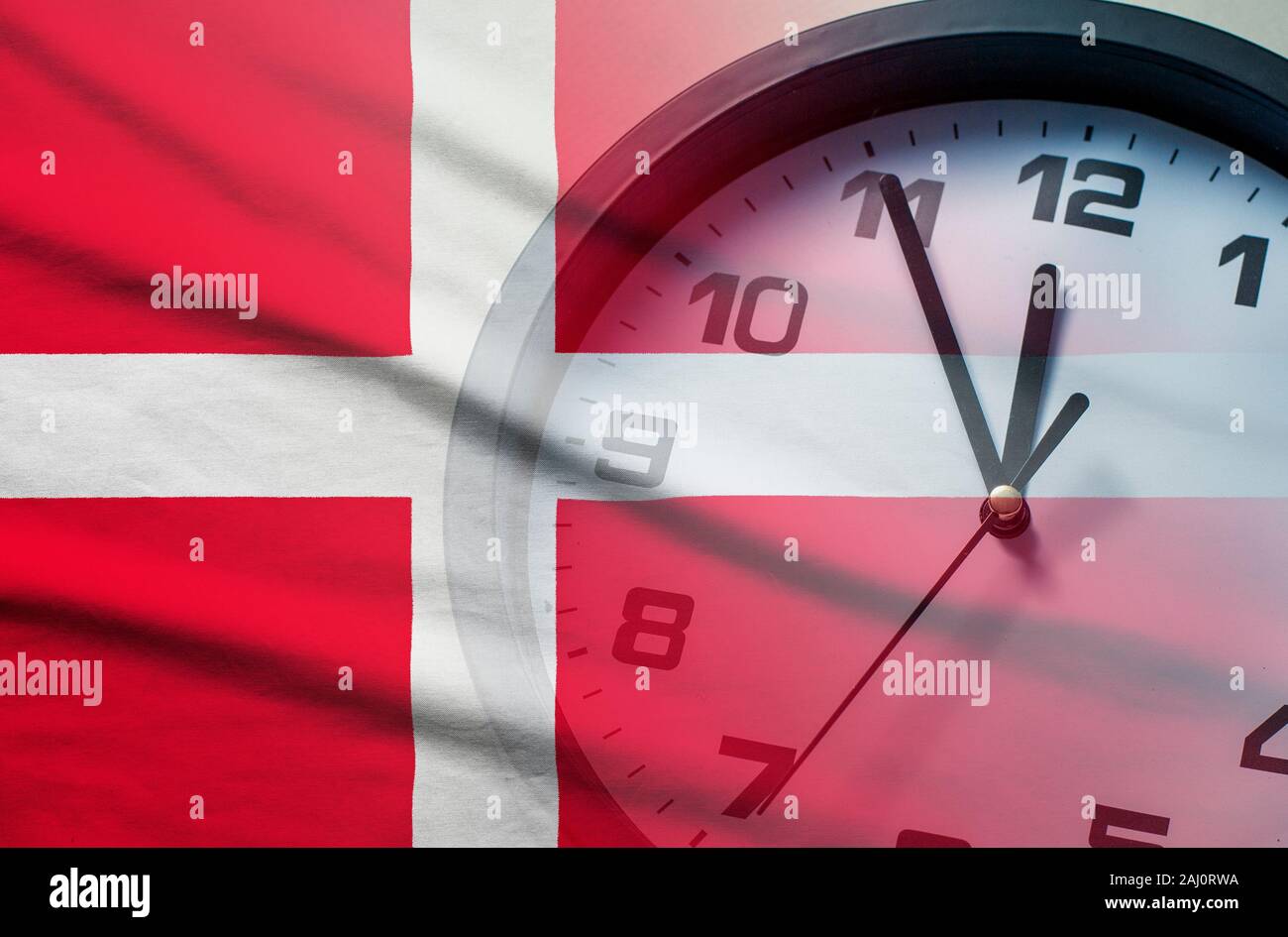 Denmark flag with dial of a clock Stock Photo