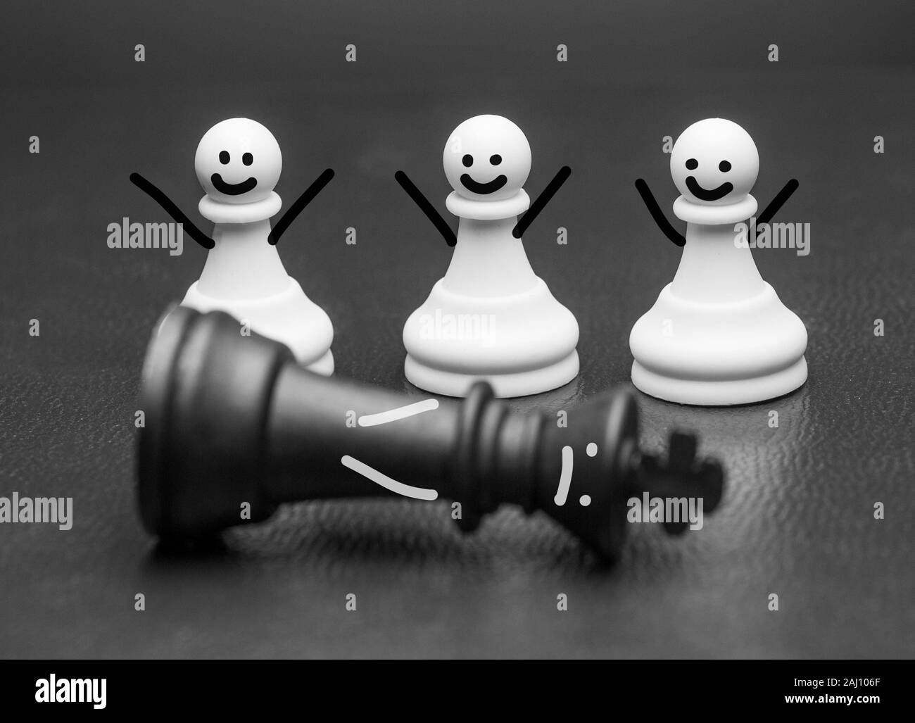 Chess piece pawns with smiles and arms rejoicing Stock Photo