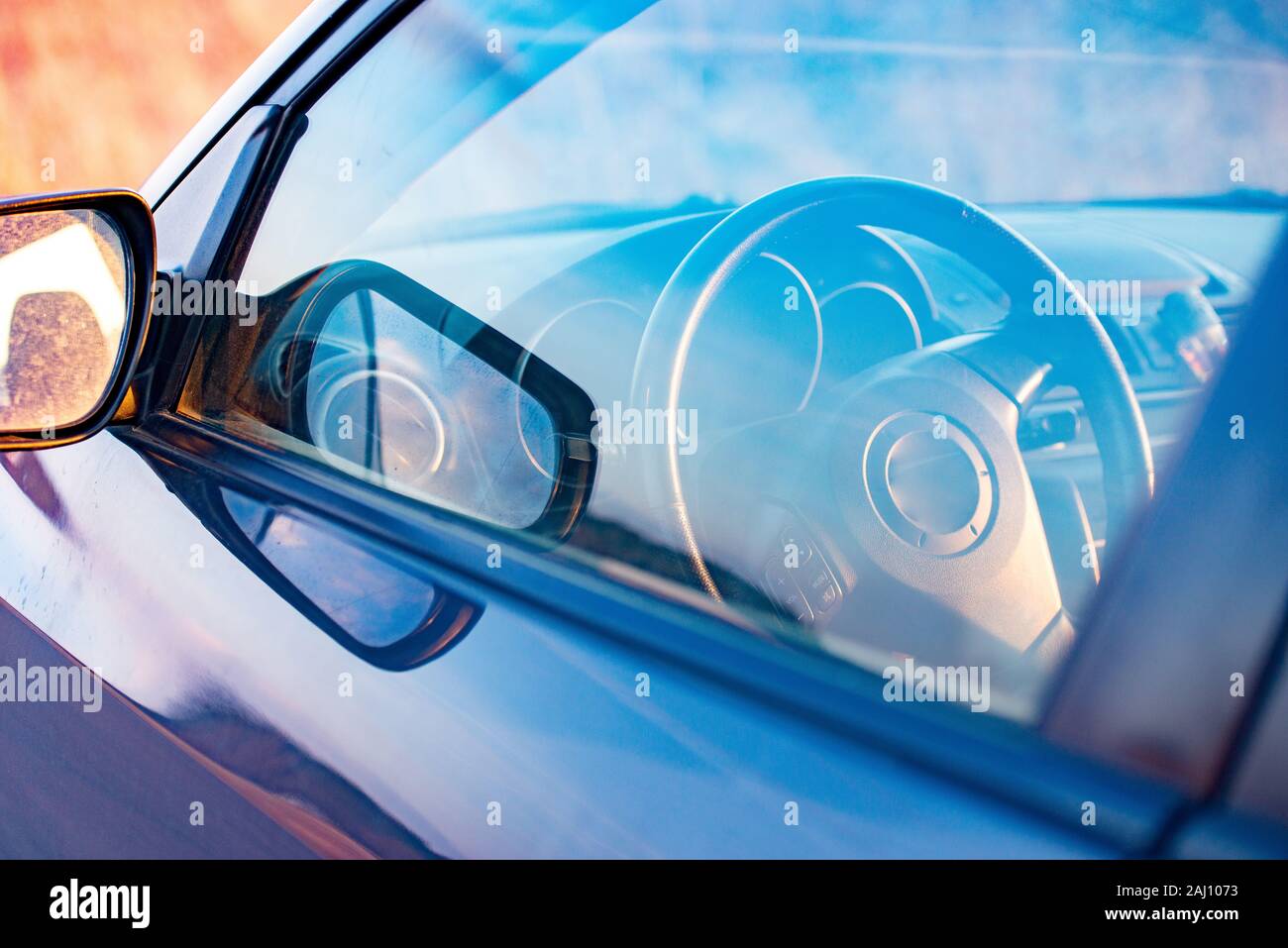 Interior view of car focus on the steering wheel Stock Photo - Alamy