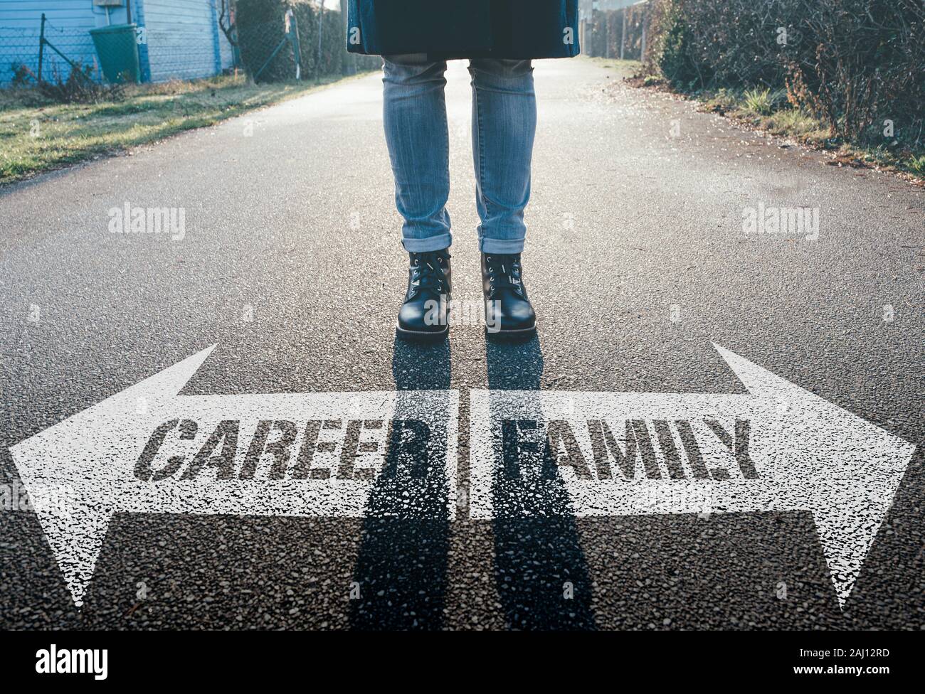 female person having to decide between career and family Stock Photo