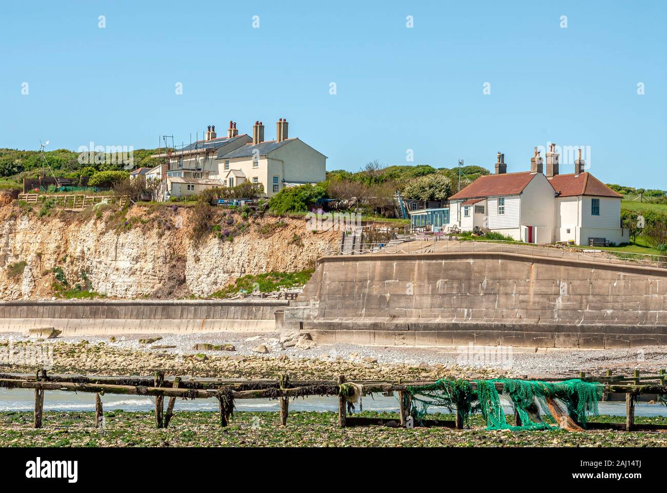Coast guard cottages at the Seven Sisters Country Park, East Sussex, England, UK Stock Photo
