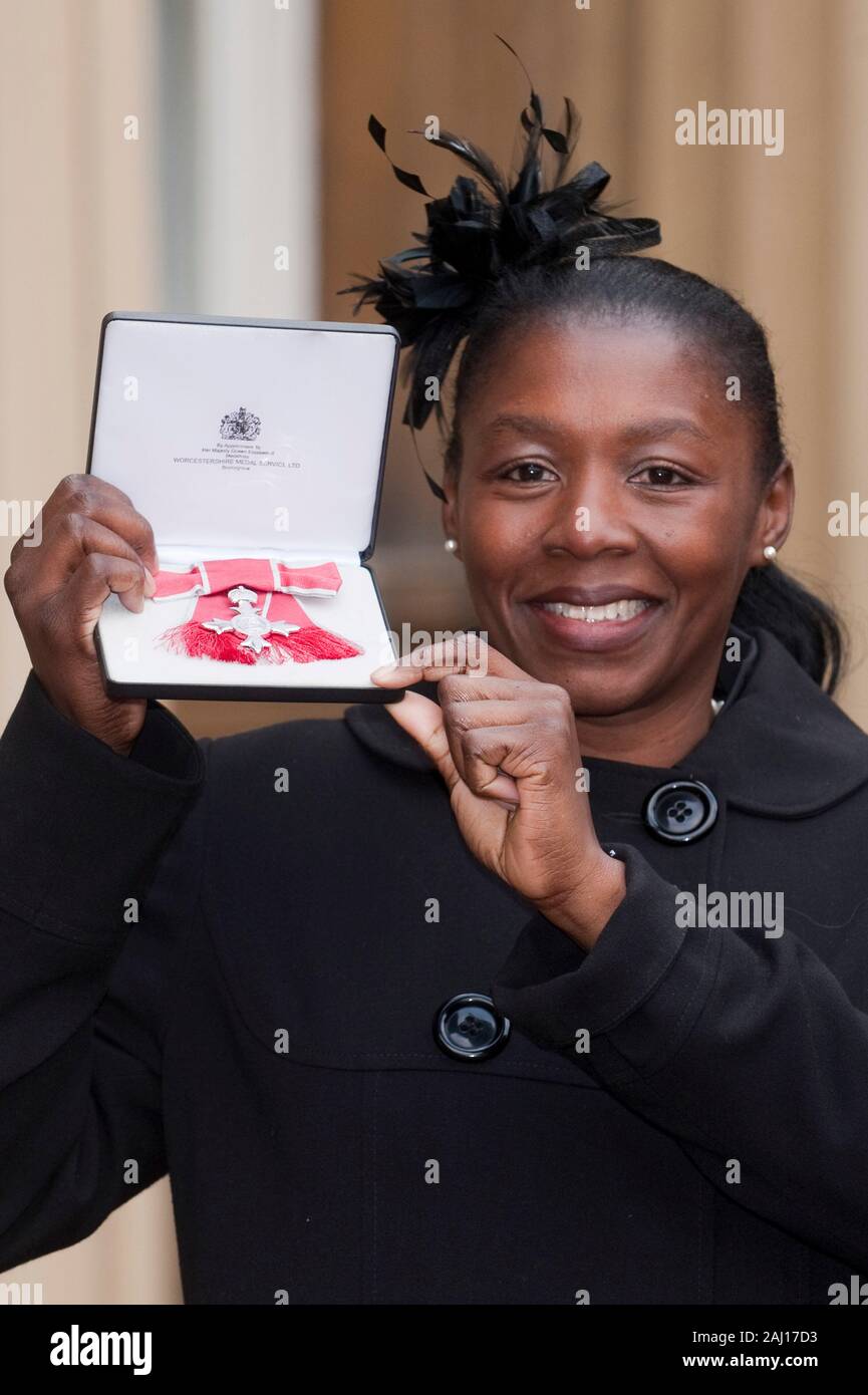 England Women's rugby international Maxine Edwards who received an M.B.E. from the Queen at the Investiture ceremony at Buckingham Palace. Stock Photo