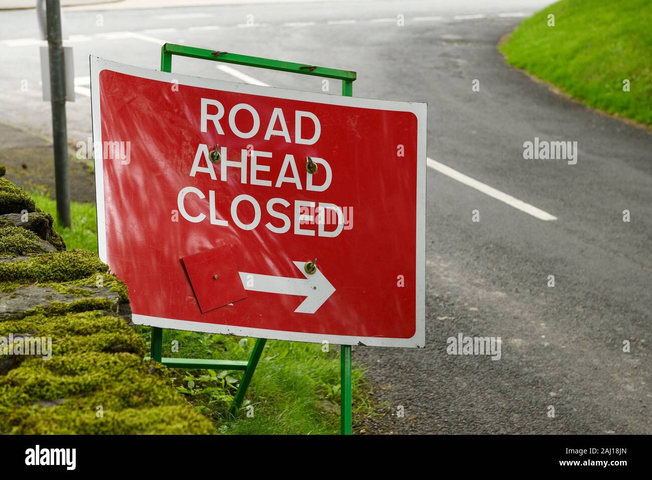 A red road ahead closed sign in Spennithorne village in Yorkshire UK Stock Photo
