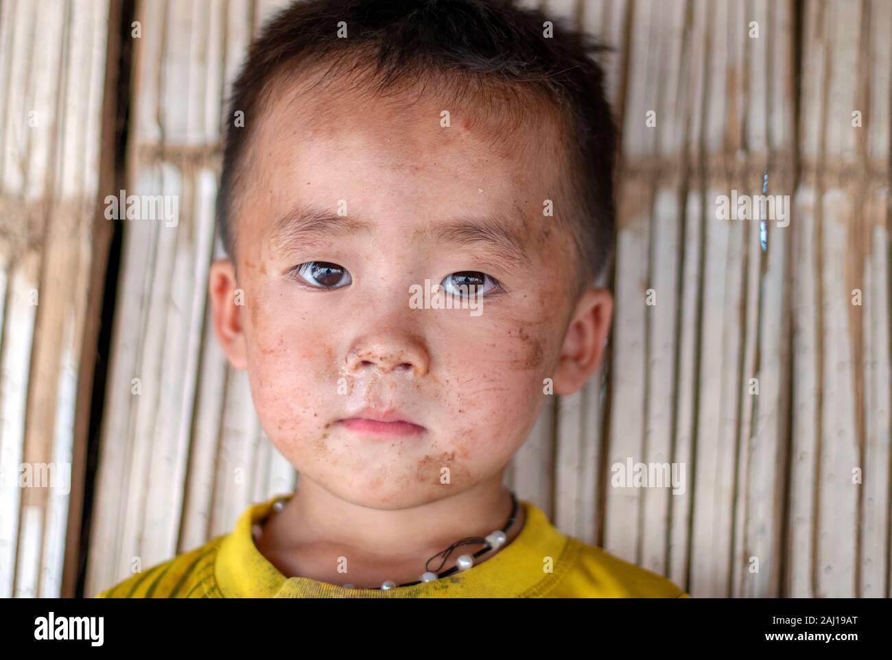 Portrait of asian boy with a dirty face Stock Photo