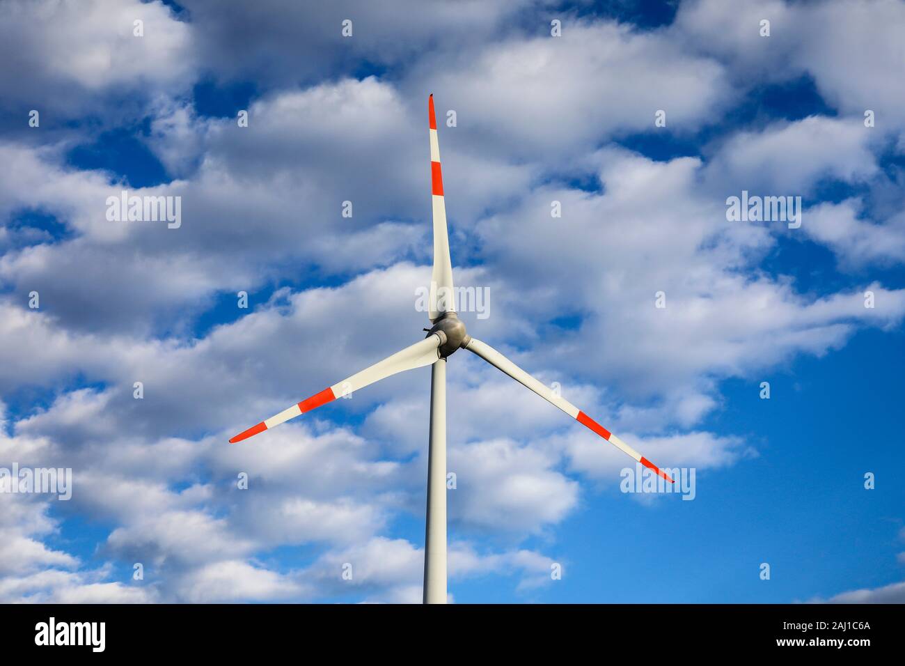 Juechen, North Rhine-Westphalia, Germany - Wind turbines against a sky with clouds. Juechen, Nordrhein-Westfalen, Deutschland - Windraeder vor Himmel Stock Photo