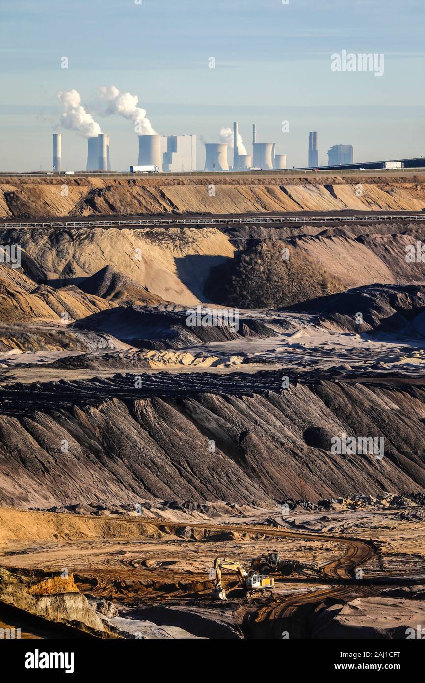 Juechen, North Rhine-Westphalia, Germany - RWE opencast lignite mine Garzweiler, Rhenish lignite mining area. In the back the RWE power plants Frimmer Stock Photo