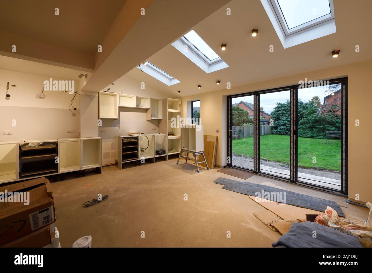 A new kitchen being fitted in a rear extension project at a house in Cheshire UK Stock Photo