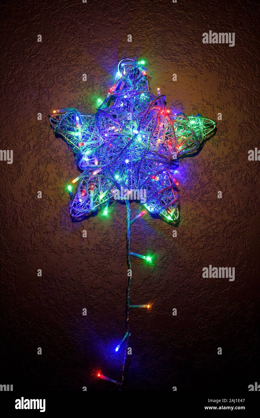 Overhead flat lay of a star shape with fairy lights Stock Photo
