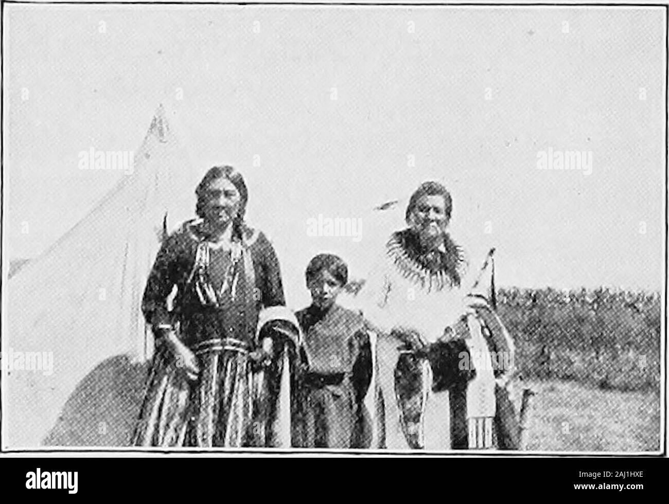 History and stories of Nebraska . toes gave each of us a pony.The agent for the Otoes said he had a telegram that thechiefs had run away, not to give us food or shelter or anyhelp. The Otoe agent afterward said when the Ponca chiefscame into his office that they left the prints of their feet inblood upon the floor. When the chiefs reached their own homes at themouth of the Niobrara they found there the agent whohad left them in the Indian Territory. He had sol-diers with him and wasmaking the Ponca peo-ple pack up their goodsin order to start for thenew country. The sol-diers put the women and Stock Photo