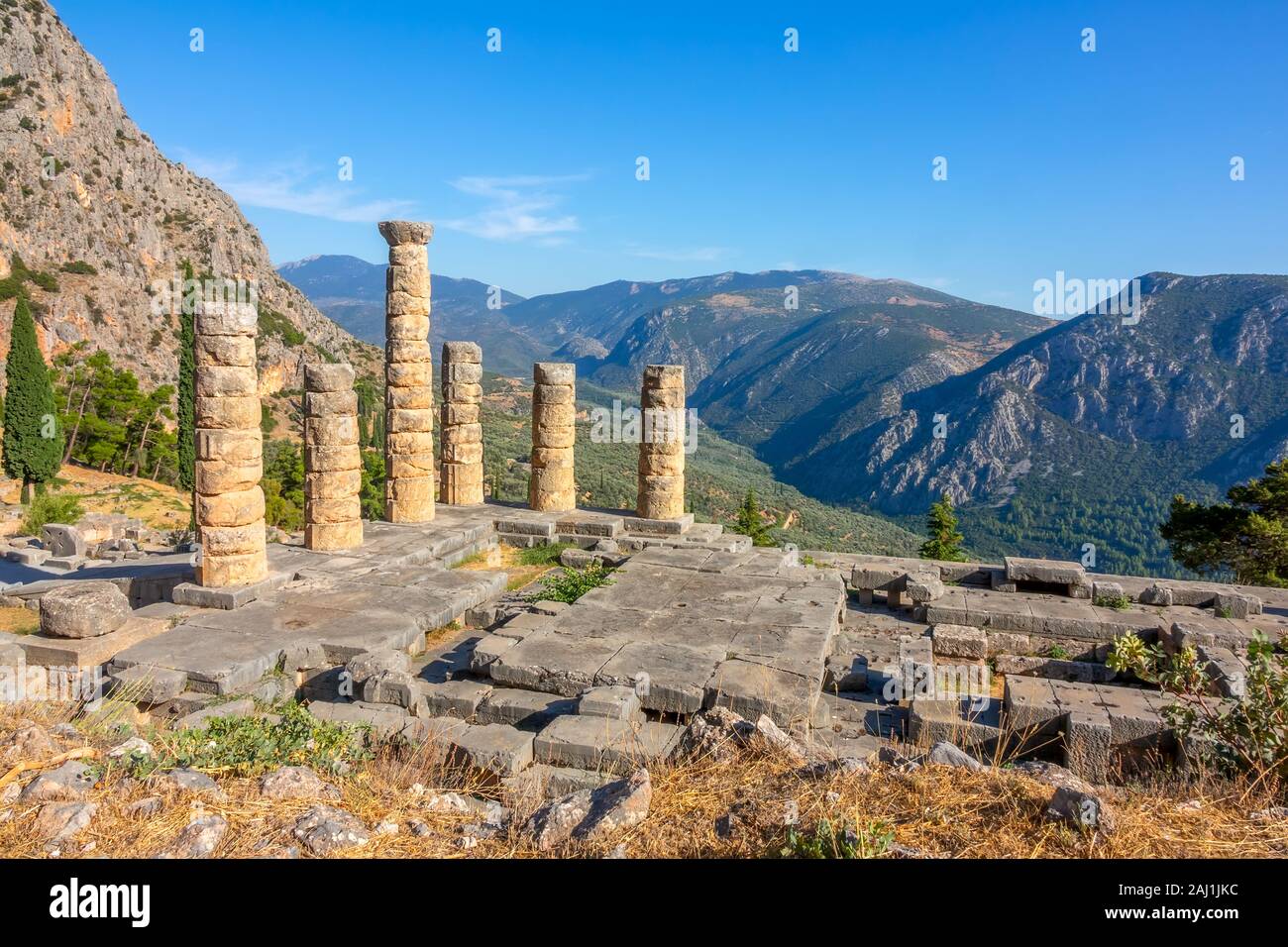 Greece. Delphi. Ancient ruins on a background of sunny mountains Stock Photo